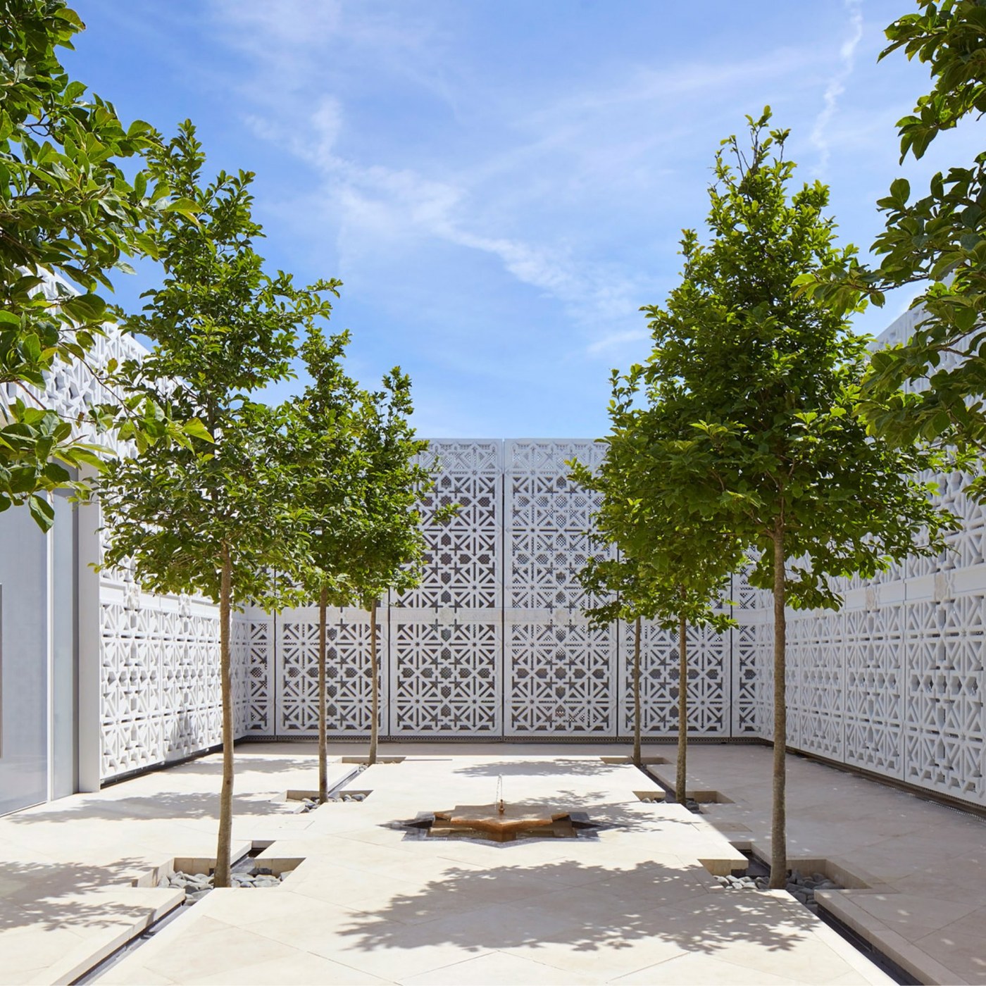 Garden of Light, Aga Khan Centre — courtyard with jali screens and magnolias